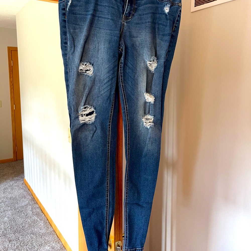 Distressed skinny jeans.